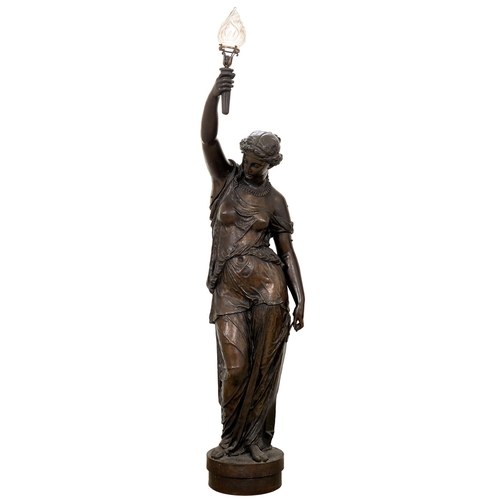 1034 - A bronzed iron life sized figural statuette of a maiden, 20th c, overall height 215cm... 