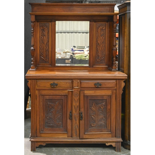 1037 - A Victorian style mahogany mirror back sideboard, the lower part enclosed by panelled doors, the upp... 