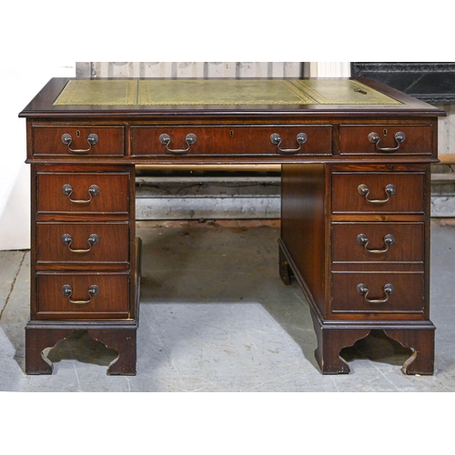 1045 - A mahogany pedestal desk, with tooled leather top, on bracket feet, 77cm h; 122 x 61cm... 