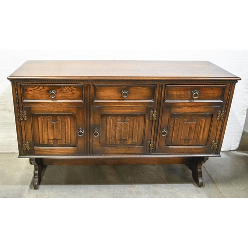 1051 - An oak gateleg table, on turned legs, 73cm h, a panelled oak sideboard, 85cm h; 148 x 49cm and a pai... 