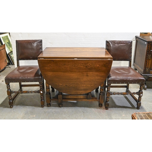 1051 - An oak gateleg table, on turned legs, 73cm h, a panelled oak sideboard, 85cm h; 148 x 49cm and a pai... 