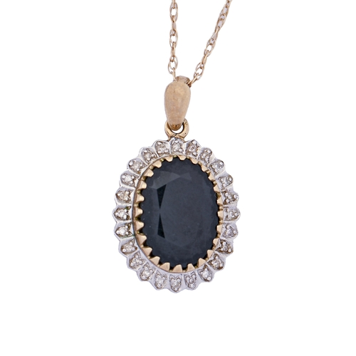 220 - A diamond and sapphire pendant, in gold, 23mm h, gold necklet, 4.4g