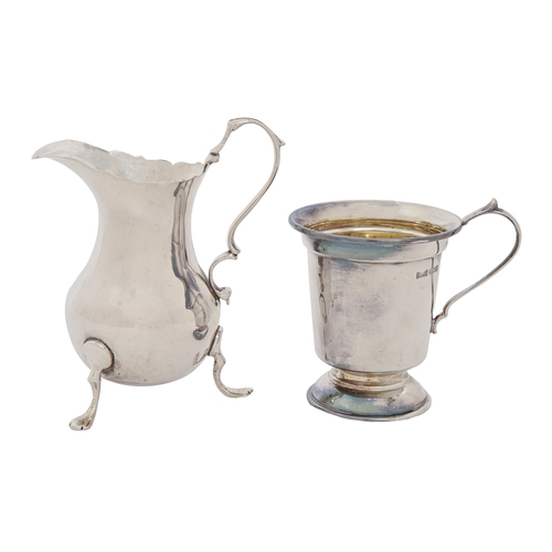 325 - A Victorian silver cream jug, on three hoof feet, 11cm h, by Thomas Hayes, Birmingham 1891 and a sil... 