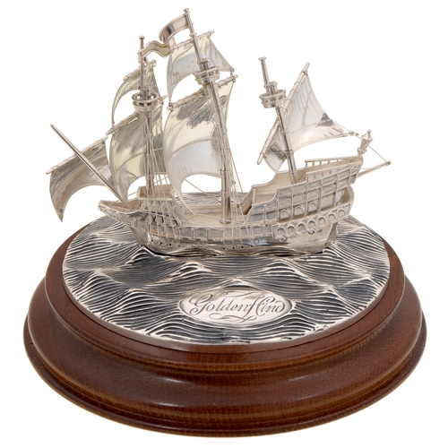 326 - An Elizabeth II silver model of The Golden Hind, on turned oak base, 12cm h, by M J Softley, London ... 