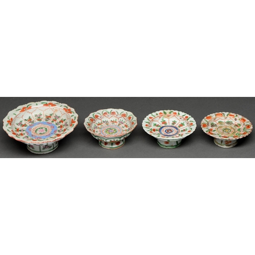 463 - Four Thai-market Chinese famille rose stands, 19th c, 11 and 16.5cm diam