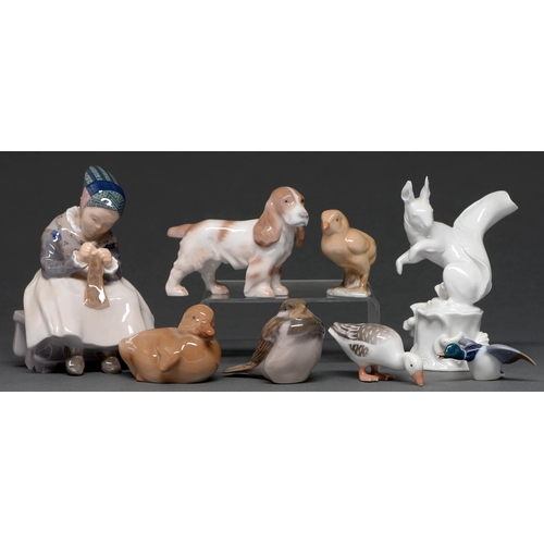 468 - A Meissen glazed porcelain model of a squirrel on a tree stump and seven Royal Copenhagen and Bing a... 