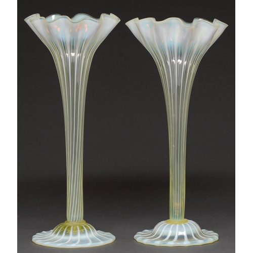 469 - A near pair of semi opalescent fluted glass vases, c1910, 33cm h