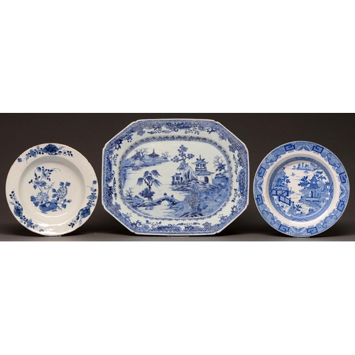 470 - A Chinese export blue and white dish, late 18th c, painted with figures on a bridge in a river lands... 