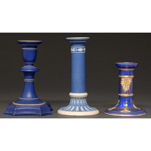 512 - A Wedgwood blue jasper candlestick, 19th c, 15.5cm h, the circular base moulded in low relief with a... 