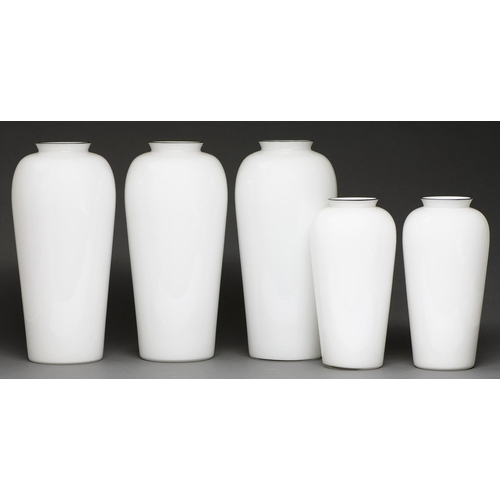 513 - A set of five white cased glass vases, with silver coloured metal rim, 42cm h