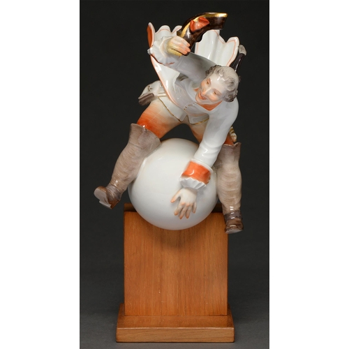 536 - A Meissen figure of Baron von Munchausen astride the moon, 20th c, designed by Alexander Struck, on ... 