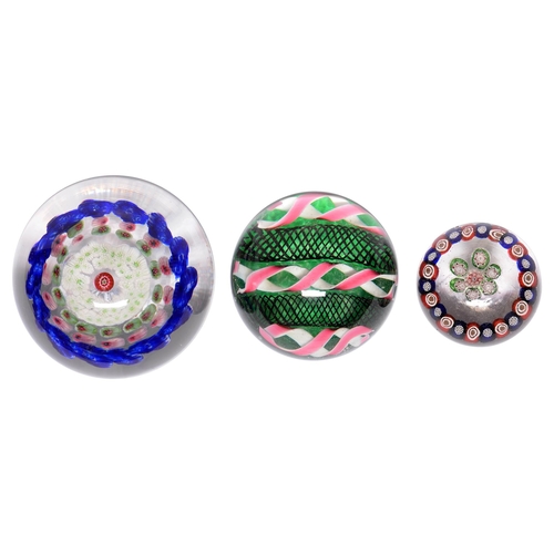 555 - Three French glass paperweights, 19th c, various millefiori and other designs, 75mm diam and smaller... 