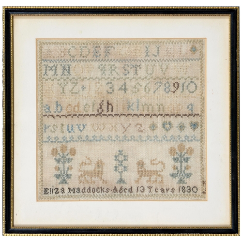 793A - A George IV wool sampler, Eliza Maddocks aged 13 years 1830, worked with lions, plants and letters a... 