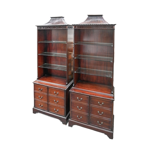 949 - A pair of mahogany chinoiserie open bookcases, late 20th c, in George III style, with pagoda top, 18... 