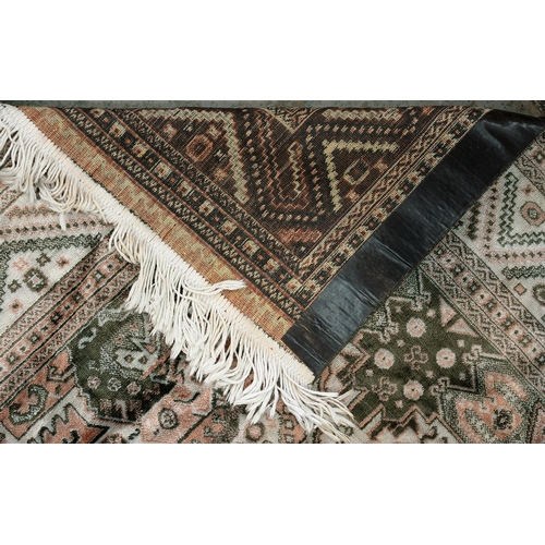 960 - A Caucasian style silky rug, 183cm x 138cm