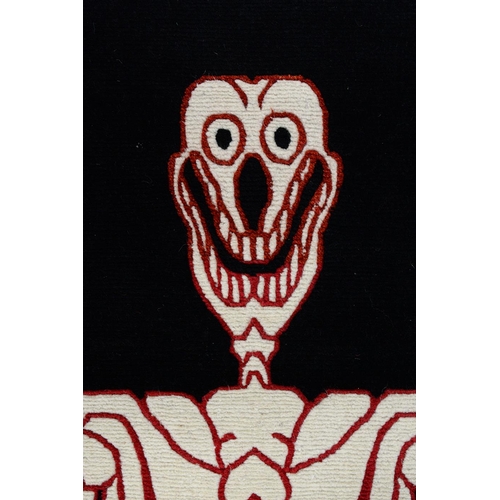 961 - A Tibetan skeleton rug, 145cm x 67cm