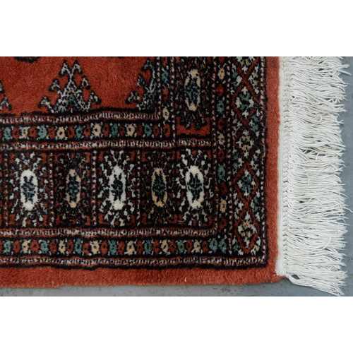 969 - Two Pakistan Bokhara rugs, 134cm x 80cm and 88cm x 63cm