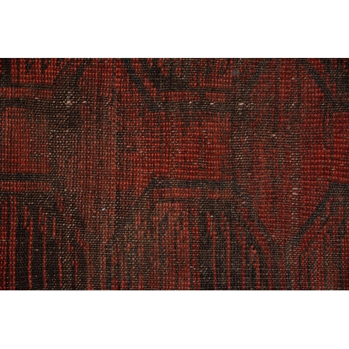 972 - A antique red Afghan Bokhara rug, 194cm x 101cm