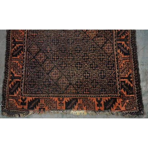 973 - An antique Baluch rug, 124cm x 92cm and a Persian Bijar Kilim rug, 102cm x 74cm