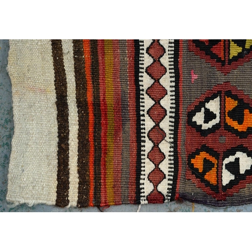 974 - An Anatolian flatweave rug, 176cm x 90cm and a Turkish Kilim rug, 131cm x 58cm (2)