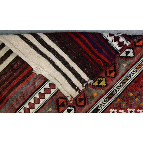 974 - An Anatolian flatweave rug, 176cm x 90cm and a Turkish Kilim rug, 131cm x 58cm (2)