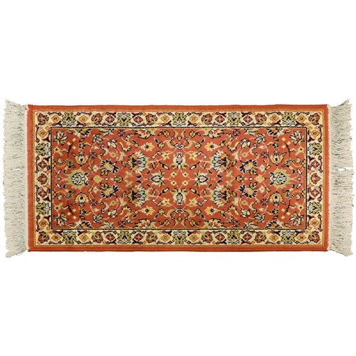 975 - A Qashqai rug, 188cm x 84cm and a Wilton rug, 120cm x 59cm