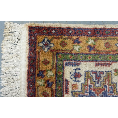 976 - A Turkish Cicim rug, 84cm x 59cm and a Turkish Dagestan rug 90cm x 60cm (2)