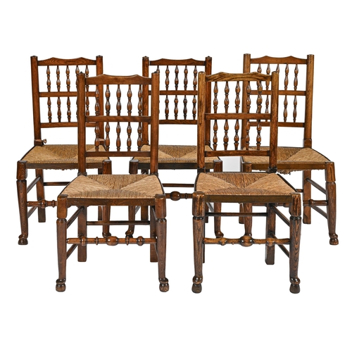 985 - Ten Victorian ash spindle back chairs, North West England, rush seated