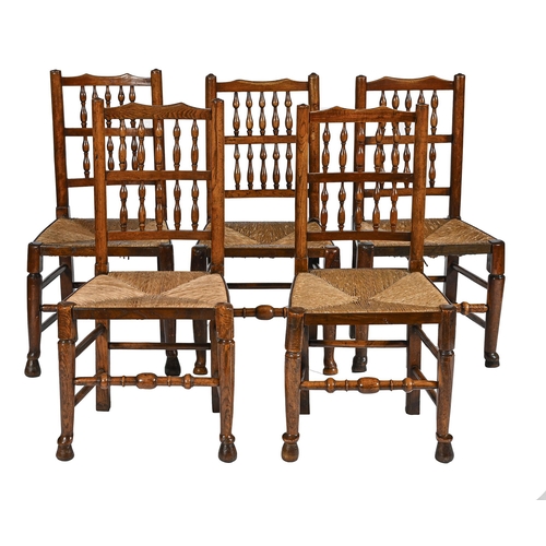 985 - Ten Victorian ash spindle back chairs, North West England, rush seated