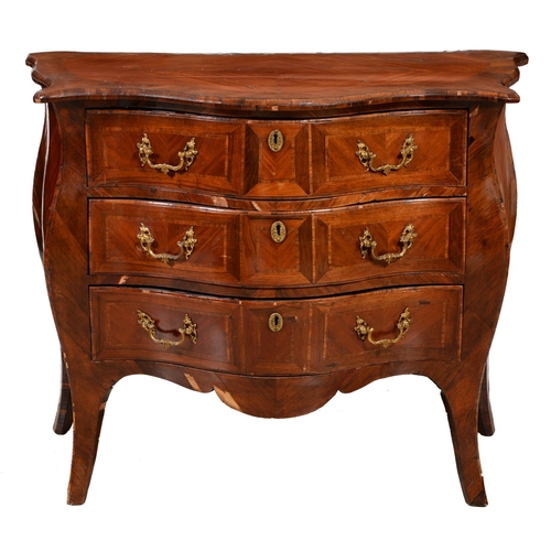 1028 - A Louis XV kingwood and rosewood commode, Scandinavia, with quarter veneered top and fitted with thr... 