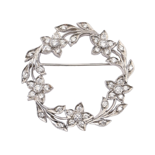 184 - A diamond brooch, designed as a circlet of flowers, millegrain set, in platinum, 38mm diam, marked P... 