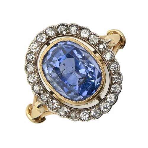 185 - A sapphire and diamond ring, early 20th c, the cushion shaped sapphire of approximately 10.55 x 12.3... 