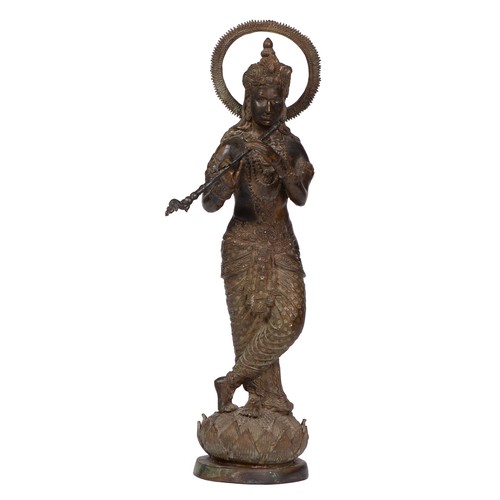 747 - Indian sculpture. Krishna, bronze, India or Nepal, playing the flute standing on lotus, 37cm h... 