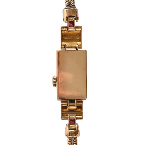 103 - An Odeon style synthetic ruby and 18ct gold cocktail watch, c1950, 14 x 21mm, on 9ct gold twin stran... 