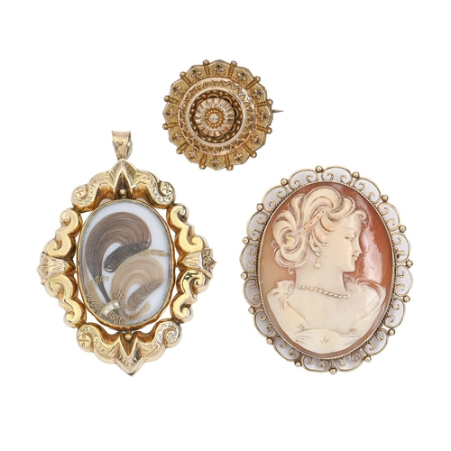 132 - A cameo brooch,  in 9ct gold, 53mm, Birmingham 1979, 14g, a Victorian gold mourning brooch, 19g and ... 