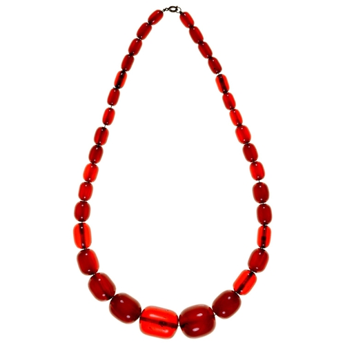 167 - A necklace of faturan beads, 82g