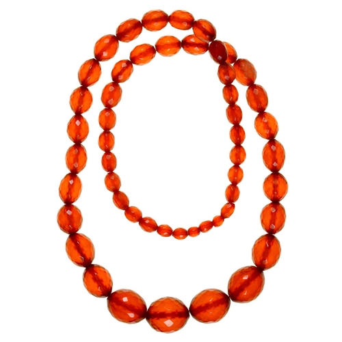 168 - A necklace of faceted faturan beads, 127g