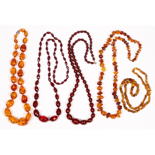 200 - Three necklaces of amber beads and two others, 380g