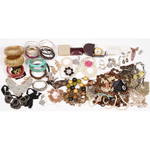 211 - Miscellaneous costume jewellery, including beads, bangles and brooches, etc