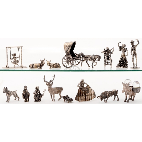 233 - Fifteen silver and metalware toys, late 20th c, including Spanish and other figures and animals, var... 