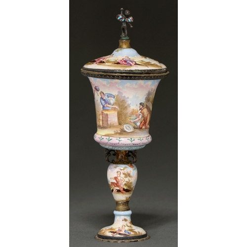 246 - A Viennese silver gilt and painted enamel cup and cover, c1900, painted with mythological scenes, th... 