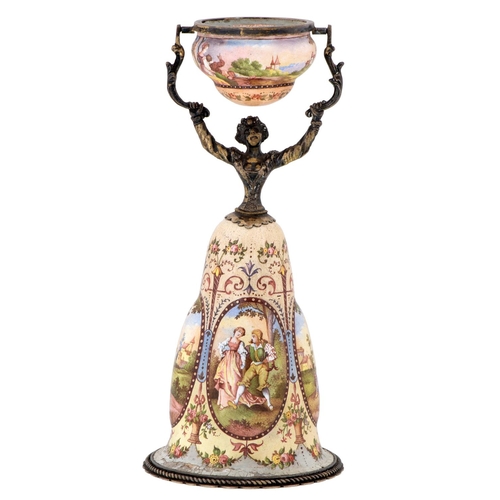 247 - A Viennese silver gilt and painted enamel wager cup, early 20th c, in the form of a woman, her skirt... 