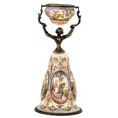 247 - A Viennese silver gilt and painted enamel wager cup, early 20th c, in the form of a woman, her skirt... 