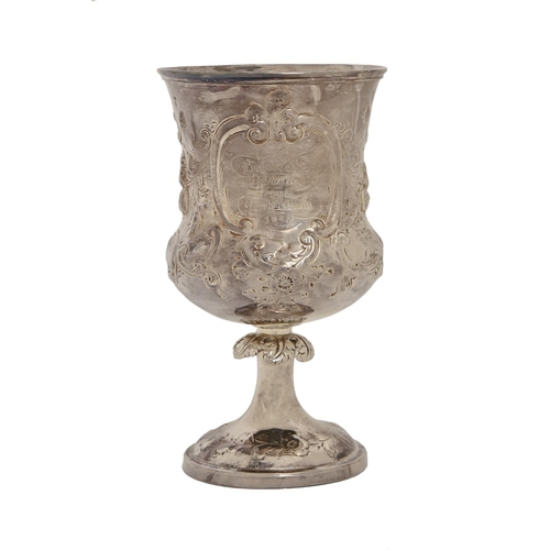 259 - A Victorian silver goblet,  chased with fruit and flowers and engraved with contemporary inscription... 