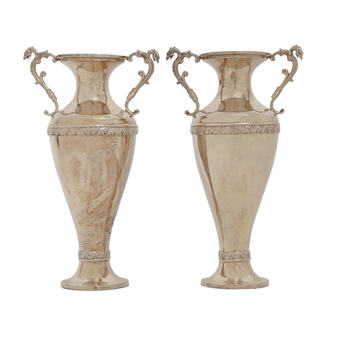 278 - A pair of Victorian silver vases, with grotesque bird handles, 19.5cm h, by William Comyns & Son... 