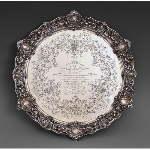 327 - Irish interest. A fine Victorian silver testimonial salver, the field engraved with shells and leafy... 