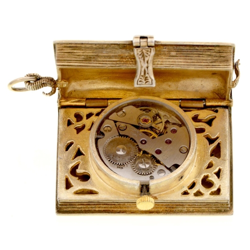 408 - An Elizabeth II silver gilt miniature timepiece in the form of a book, 39mm l, London, date letter i... 