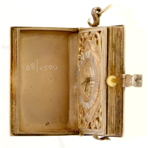 408 - An Elizabeth II silver gilt miniature timepiece in the form of a book, 39mm l, London, date letter i... 