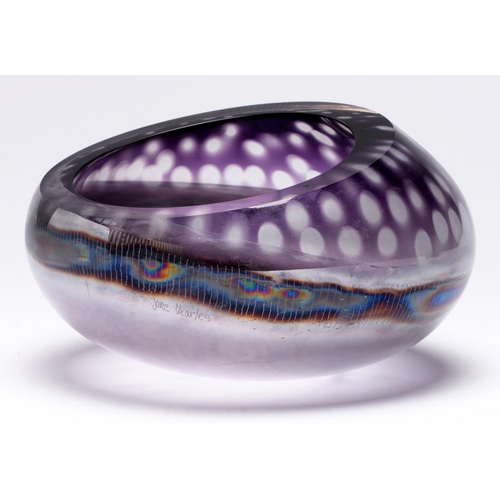 555 - Studio glass. An amethyst flashed glass bowl by Jane Charles, 21cm diam