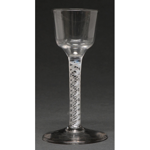 569 - A George III wine glass, the ogee bowl on double series opaque twist stem, 14.3cm h